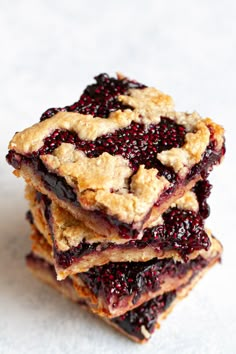 three pieces of berry pie stacked on top of each other