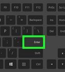 a computer keyboard with the enter button highlighted