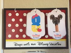 two tags hanging on a wall with the words days with our disney vacation