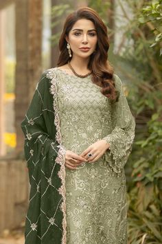 A sophisticated Pakistani salwar kameez in dusty pista green, complete with stunning contrast in the form of a dark green dupatta work. Dress Type : Semi-Stitched ( Free Size ) Top Fabric : Heavy Faux Georgette ( With Beautiful Embroidery Work + Moti Work ) Top Inner : Santoon Bottom : Santoon Dupatta : Heavy Faux Georgette ( Golden ... Dark Green Dupatta Combination Suit, Pista Dress Combination, Pista Green Combination, Pista Green Lehenga Combination, Dark Green Combination Outfit, Green Dress Combination, Pista Green Dress, Stylish Pakistani Outfits, Green Combination Outfit