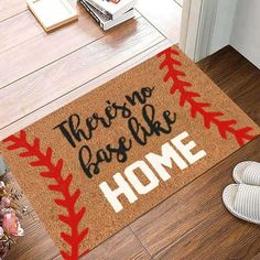 a door mat that says, there's no place like home on the floor