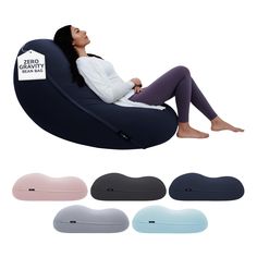 a woman sitting on an inflatable bean bag chair with four different colors and sizes