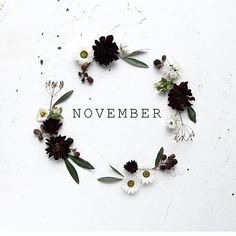 flowers arranged in a circle with the words november