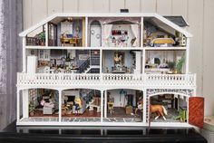 a doll house with all the furniture and accessories