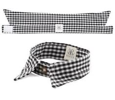 the black and white checkered tie is next to an empty bow tie on a white background