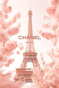 the eiffel tower is surrounded by pink flowers