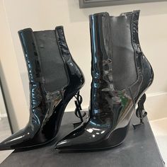 Black Patent Leather Ysl Bootie Wear Is Shown In Photos Ankle Boots Ysl, Ysl Bootie, Yves Saint Laurent Shoes, Saint Laurent Shoes, Black Patent Leather, Bootie, Patent Leather, Yves Saint Laurent, Bootie Boots