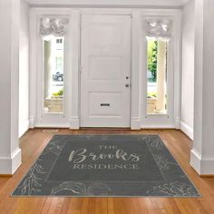 a white door with a welcome mat in front of it