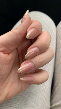 Glitter Gold Nails Ideas, Nude Nails Gold Glitter, Sparkly Gold Tip Nails, Cute Nails For Formal, Gold Sparkle French Tip Nails Almond, Glitter Gold Tip Nails, Nails 2024 Wedding, Nails To Match Brown Dress, Nail Inspo Gold Glitter