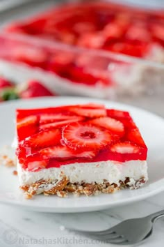 a piece of cheesecake with strawberries on top