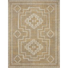 a beige rug with an intricate design on it