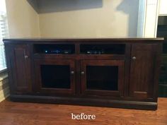 a large entertainment center with built in speakers