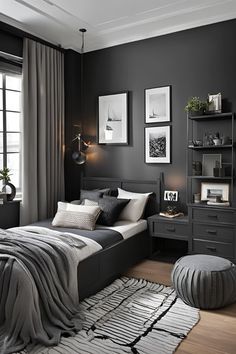 a black and white bedroom with a bed, nightstands, lamps and pictures on the wall