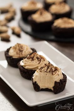 there are three desserts on the plate and one is brownie cupcakes