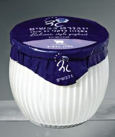 a blue and white container sitting on top of a table