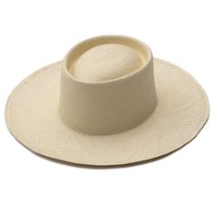 A classic style for men and women, perfect for a stylish sunny day. This traditional hat is woven and shaped by hand. Toquilla straw Brim 4" Crown height 4" Sizing Guide Place measuring tape around your head across the mid-forehead, where you like your hats to sit. Hold the tape firmly, but not too tightly. Round up to the nearest centimeter. Xsmall 53cm Small 55cm Medium 57cm Large 59cm **﻿These hats are handcrafted with traditional techniques and natural fibers. Slight variations occur enhanci Handwoven Flat Brim Fedora In Toquilla Straw, Handwoven Fedora With Flat Brim In Toquilla Straw, Handwoven Toquilla Straw Fedora With Flat Brim, Classic Woven Boater Hat With Curved Brim, Artisan Toquilla Straw Hat For Kentucky Derby, Handwoven Toquilla Straw Fedora, Artisan Fedora With Curved Brim In Toquilla Straw, Artisan Woven Panama Hat With Flat Brim, Wide Brim Woven Toquilla Straw Boater Hat