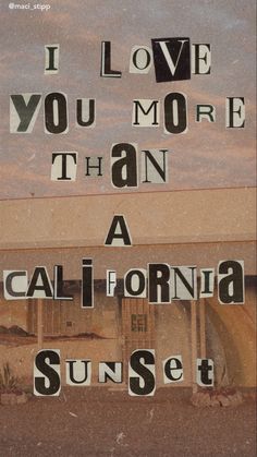 the words i love you more than a california sunset written in cut out letters on a building