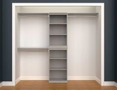 an empty closet is shown with shelves and shelving