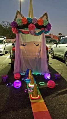 a car decorated with lights and decorations on the road