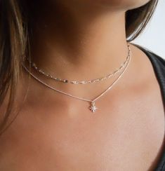 "A silver set of 2 necklaces - North star necklace + Gorgeous chain choker The necklaces are separated so each can be worn on its own or layered with other necklaces. ⊹ L e n g t h Choker - 13\" + 3\" extender North star necklace - 15\" + 2\" extender chain ⊹ D e t a i l s * Chain Choker: Sterling silver  * North Star Necklace: Sterling silver chain 10mm Cubic Zirconia north star pendant - 2 micron silver plated (safe to use in water, will not tarnish) Sterling silver spring clasp and links Read North Star Pendant, Silver Necklace Designs, Necklaces Ideas, North Star Necklace, Silver Necklace Simple, Fashionable Men, Diamond Choker Necklace, Necklace Clasps