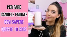 a woman holding a candle in her hand with the caption per fare candle fadiate devi sapre queste 10 cose