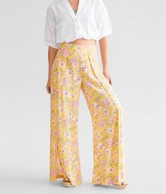 Billabong Split Spirit Tropical Beach Pant - Yellow Small, Women's Goldenpeach Floral print crinkle woven flyaway pant Rise measures 11 Inseam measures 30 Smocked back waistband. 100% Viscose. Hand wash separately inside out. Do not bleach. Do not tumble dry. Cool iron if needed. Do not dry clean.. WOMEN'S BOTTOMS SIZE CONVERSION CHART Waist (size) 22 23 24 25 26 27 28 29 30 31 32 33 34 36 38 Juniors - 00 0 1 3 5 7 9 11 13 15 - - - - US - - 00 0 2 4 6 8 10 12 14 16 18 20 22 S/M/L Sizing - XXS XS Printed Relaxed Fit Bottoms For Vacation, Relaxed Fit Printed Bottoms For Vacation, Summer Wide Leg Printed Bottoms, Yellow Floral Print Long Pants, Spring Printed Rayon Bottoms, Relaxed Fit Printed Pants For The Beach, Printed Wide Leg Bottoms For Beach Season, Vacation Rayon Wide Leg Trousers, Wide Leg Printed Bottoms For Beach Season