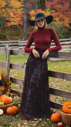 Stay stylish this season with a deep-red turtleneck paired with a flowy floral maxi skirt. Add chunky-heeled ankle boots for an effortlessly chic autumn look! Perfect for fall days. #AutumnStyle #FloralMaxi #RedTurtleneck #FallOutfitInspo Cozy Fall Vibes, Chic Autumn, Autumn Look, Maxi Skirt Outfits, Red Turtleneck, Fall Days