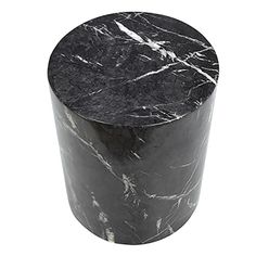 a black and white marble side table on a white background with the top half turned down