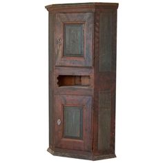 a tall wooden cabinet with two doors on the front and one door open to reveal a shelf