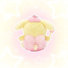 a yellow stuffed animal with a pink bow on it's head and holding a wand