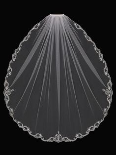 a wedding veil is shown on a black background