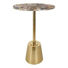 a round table with a gold base and marble top on an isolated white background photo