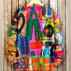 Sweater Colorful Art Size Large Small And Medium New Small Medium Large Colorful Patchwork Casual Sweater, Colorful Casual Patchwork Sweater, Multicolor Printed Long Sleeve Sweater, Multicolor Festival Tops For Fall, Multicolor Cotton Sweater With Letter Print, Multicolor Graphic Print Winter Top, Winter Multicolor Graphic Print Sweater, Multicolor Graphic Print Sweater For Winter, Multicolor Graphic Print Sweater For Fall