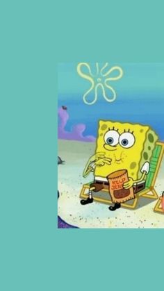 spongebob is sitting in a beach chair on the sand