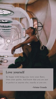 a woman in a black dress sitting on a chair with a quote above her that says love yourself