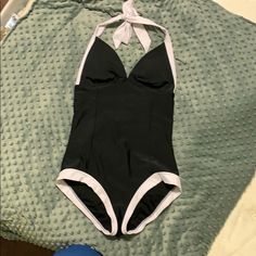 Super Cute Vintage Style Swimsuit. Never Worn, Nwot. This Suit Is Black And White, The Polka Dot One Is Just A Stock Photo To Show The Style. Halter Tie Behind The Neck And Full Coverage Bottom. Size Medium. Reposhing This Item I Purchased From @Harless10. Tried It On But It Didn’t Fit In The Bust (I’m Very Very Small Chested). Would Wear Like A True Medium. Questions? Leave A Comment Below! 90s Swimsuit, Retro Black Stretch Swimwear, 50s Swimsuit Vintage, 90s Bathing Suit Vintage, 50s Bathing Suit, 1950s Bathing Suits, 80s Swimsuit, Vintage Style Swimsuit, 50s Swimsuit