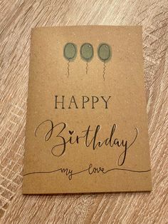 a birthday card with balloons and the words happy birthday my love written in cursive writing