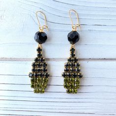 "Bewitching Halloween earrings to get you accessorized to the max during cozy fall sweater weather season. Green witch heads with black hats handcrafted with meticulously placed sparkling Swarovski Rhinestones mounted on brass filigree pieces. Earrings have  inch drop with nickel free, gold plated earring wires. Keep your Halloween accessory game strong with these earrings that are sure to have a high \"wow\" factor! Visit our Halloween shop section for even more fun Halloween necklaces, bracelets, earrings and purse charms. Great Halloween gift or treat yourself! Thanks for looking!" Halloween Necklaces, Cozy Fall Sweater, Halloween Bride, Cozy Sweaters Autumn, Black Hats, Brass Filigree, Halloween Necklace, Earring Wires, Bride Earrings