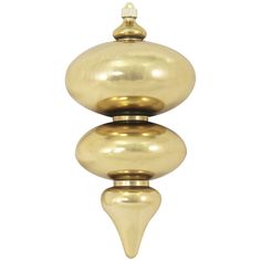 a gold candle holder on a white background