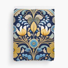 a blue and yellow floral design with flowers on it duvet cover featuring an image of a