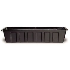 a black plastic planter on a white background