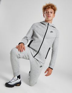 Cop a street essential with this juniors' Tech Fleece Full Zip Hoodie from Nike. Landing in a Grey colourway, this standard-fit hoodie is made with Nike's super-soft and warm Tech Fleece fabric for max' comfort. It features full zip fastening so you can switch up your style, stretchy ribbed trims to hold the shape, and zippered pockets for essential storage. Signed off with the Futura logo to the chest. Machine washable. Grey Nike Tech Fleece, Grey Nike Tech, Nike Uptempo, Nmd Adidas, Nike Jogger, Nike Tech Fleece Hoodie, Tech Fleece Hoodie, Plus Size Joggers, Nike Sweats