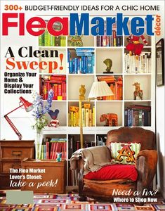 a magazine cover with a chair and bookshelf