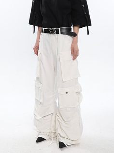 Add a fresh twist to your wardrobe with our white cargo pants. These pants offer both comfort and style, making them a versatile addition to any outfit. Model is 5'5 100lbs wearing S Modern Grunge, White Cargo Pants, Baggy Pants, Baggy Pant, Cargo Pants, Twist, Wardrobe, Outfit Inspo, Pants