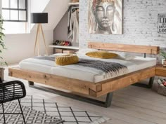 a bedroom with white brick walls and wooden furniture