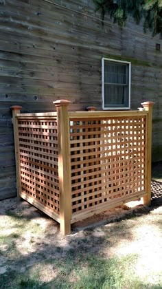 a wooden fence sitting next to a building