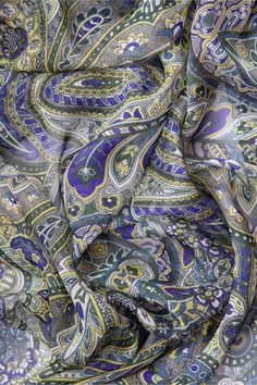 Indulge in the ethereal charm of this extra-large square scarf, with paisley design printed on gossamer-light sheer silk chiffon. You can style this versatile piece as either a scarf or a shawl, making it a perfect addition to your wardrobe. Extra large size: Approx. 55" x 55". The perfect size for wearing as a shawl as well as a scarf. 100% silk chiffon: A luxurious, gossamer-light fabric known for its sheer, delicate texture and graceful drape. Its natural breathability and gentle movement enhance the beauty of our designs. Unlike common synthetic chiffon, our chiffon is pure natural silk, offering unmatched elegance and quality. Pure luxury, naturally dyed: We use non-toxic vegetable dyes that preserve the silk's softness, free from harmful chemicals that can irritate your skin (and is Green Silk Square Scarf, Elegant Silk Scarf With Paisley Print, Elegant Patterned Silk Scarf With Paisley Print, Multicolor Silk Scarf With Paisley Print, Gentle Movement, Large Silk Scarf, Scarf For Women, Natural Silk, Paisley Design