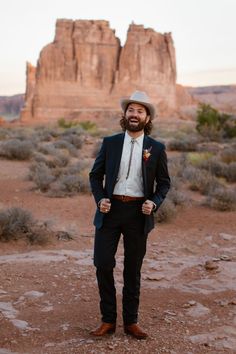 bolo tie, desert wedding, cowboy boots, moab elopement, blue suit, groom style, cowboy hat Suit With Cowboy Boots, Cowboy Wedding Attire, Wedding Outfits For Men, Classic Boho Style, Cowboy Suit, Fall Wedding Outfits