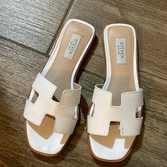 New Never Used Steve Madden White Sandals.Size 5.5 Platform Sandals Steve Madden, Tan Cushioned Sandals For Summer, Tan Slip-on Sandals For Spring, Tan Open Toe Sandals With Cushioned Footbed, Tan Flat Sandals For Spring, Tan Open Toe Sandals For Spring, Flat Tan Sandals For Spring, Spring Tan Open Toe Sandals, Tan Flat Heel Sandals For Spring