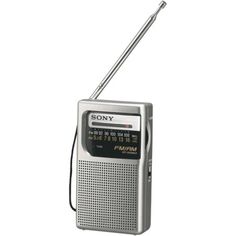 an old fashioned radio is sitting on a white surface and has the word sony written on it